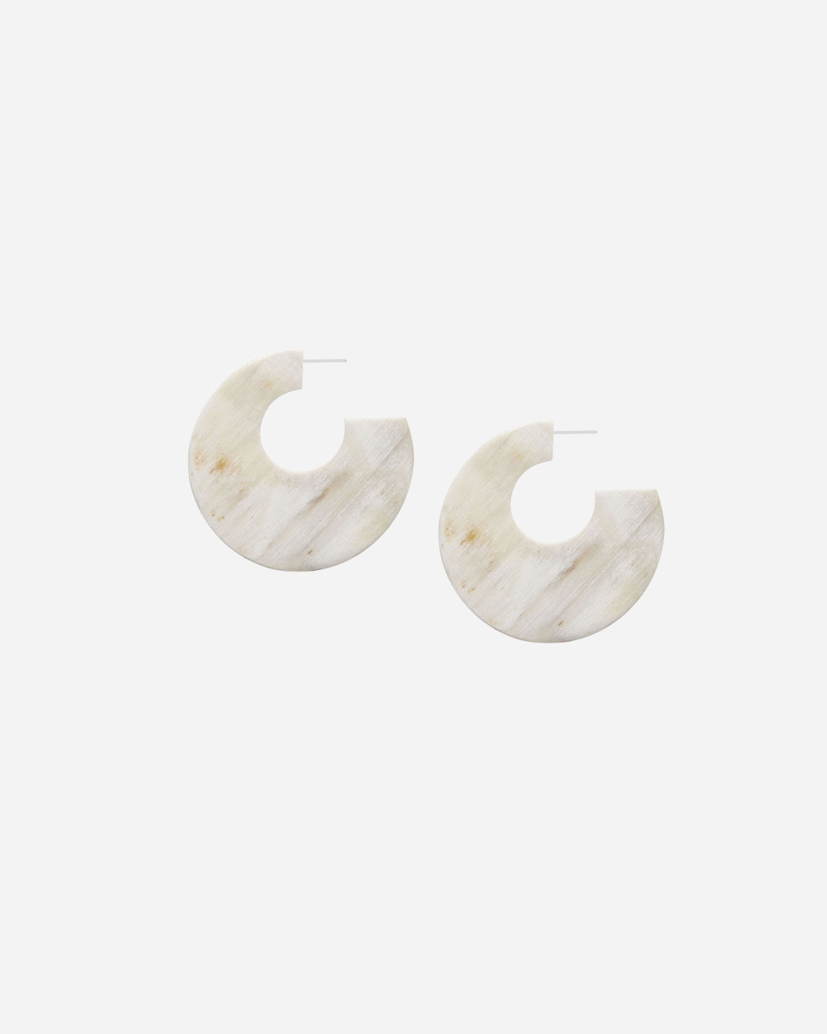 Pair of natural 
white hoop earrings on a white background