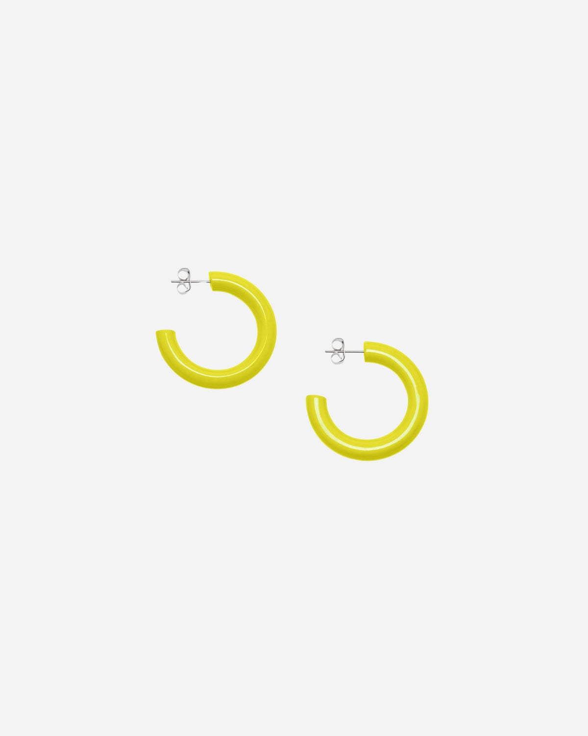 Pair of yellow hoop earrings on a white background