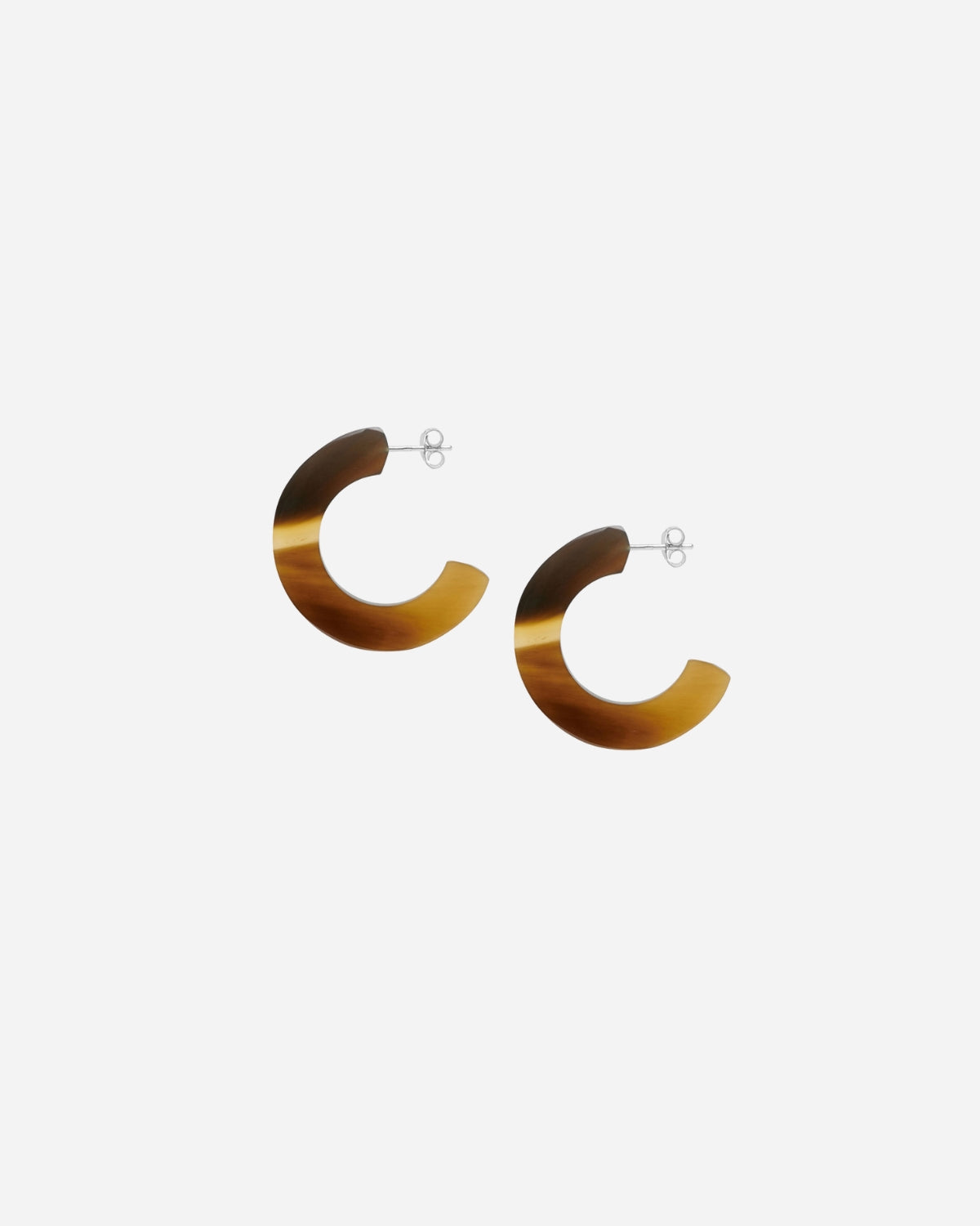 Hoop earrings with tortoiseshell design on a white background