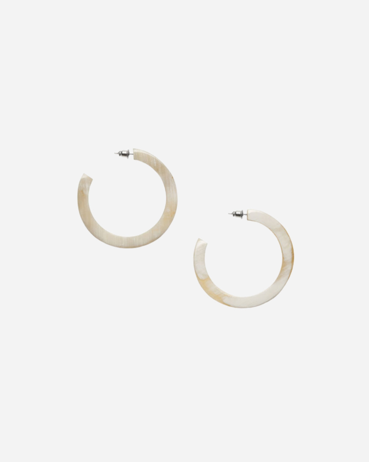 Pair of white and beige hoop earrings on a white background