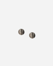 Pair of round earrings on a white background
