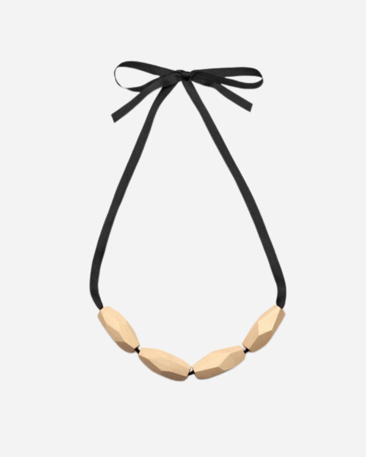 Necklace with black strap and wooden beads on a white background