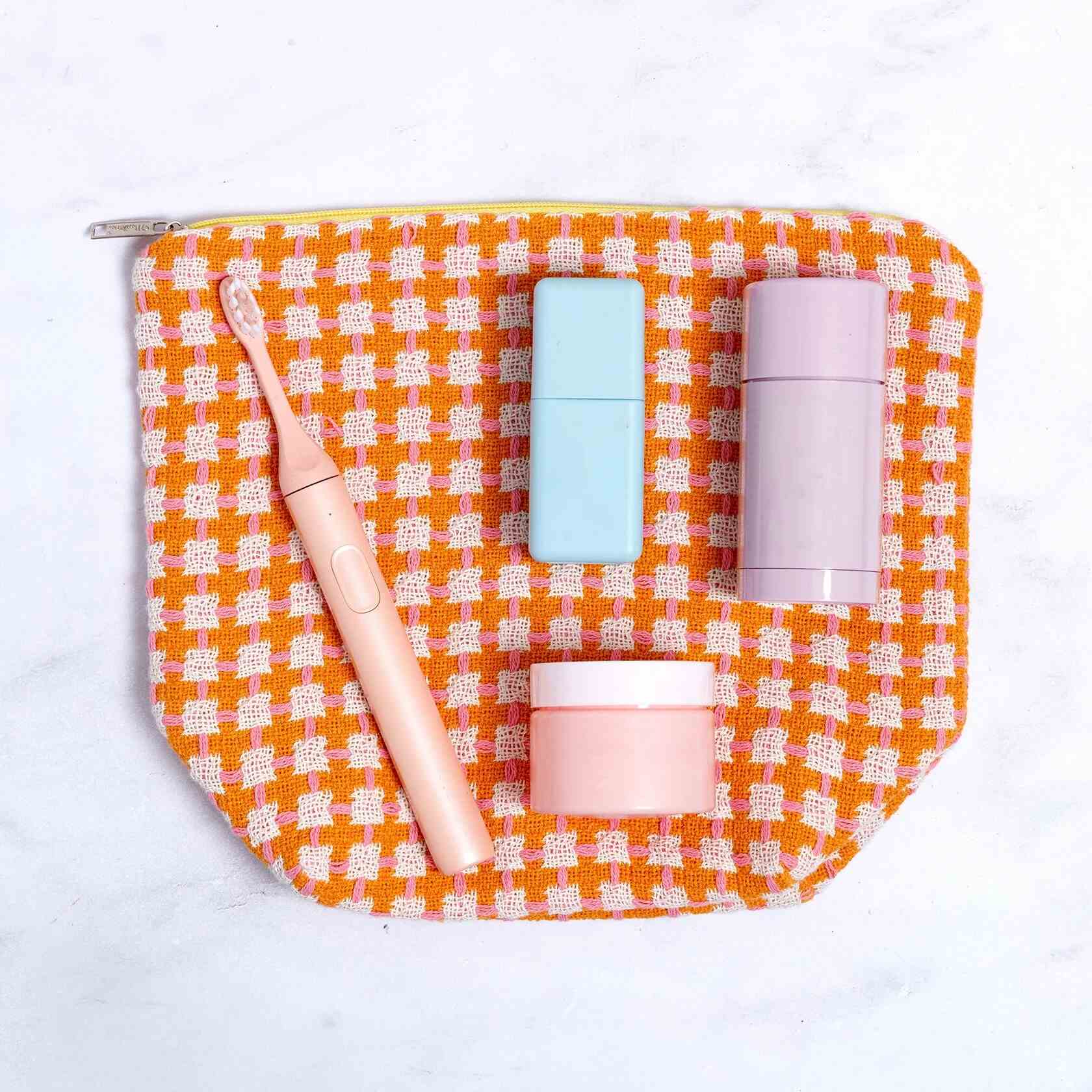 RECYCLED COTTON WASH BAG: ORANGE & PINK