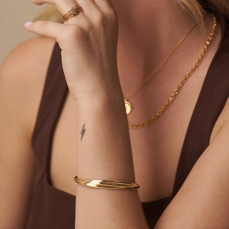 INTERLOCKING OPEN BANGLE GOLD