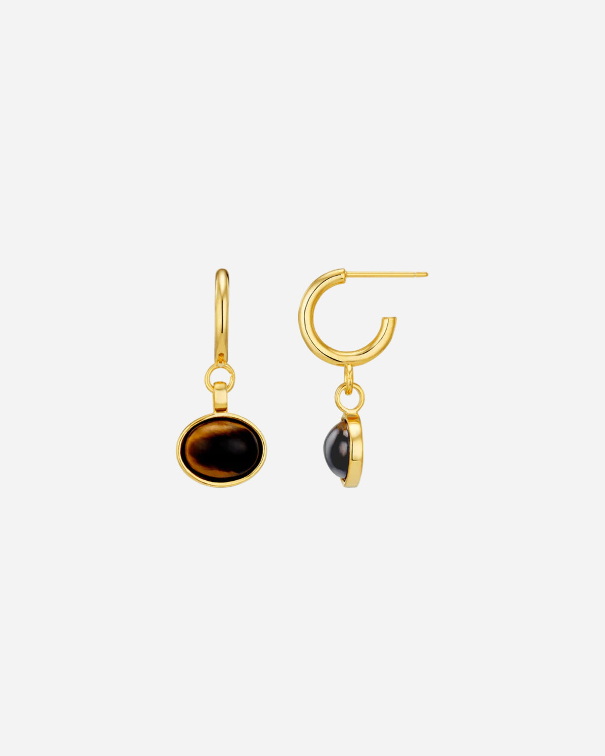 Gold hoop earrings with black stones on a white background