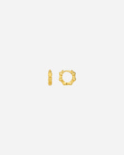 Gold hoop earrings on a white background