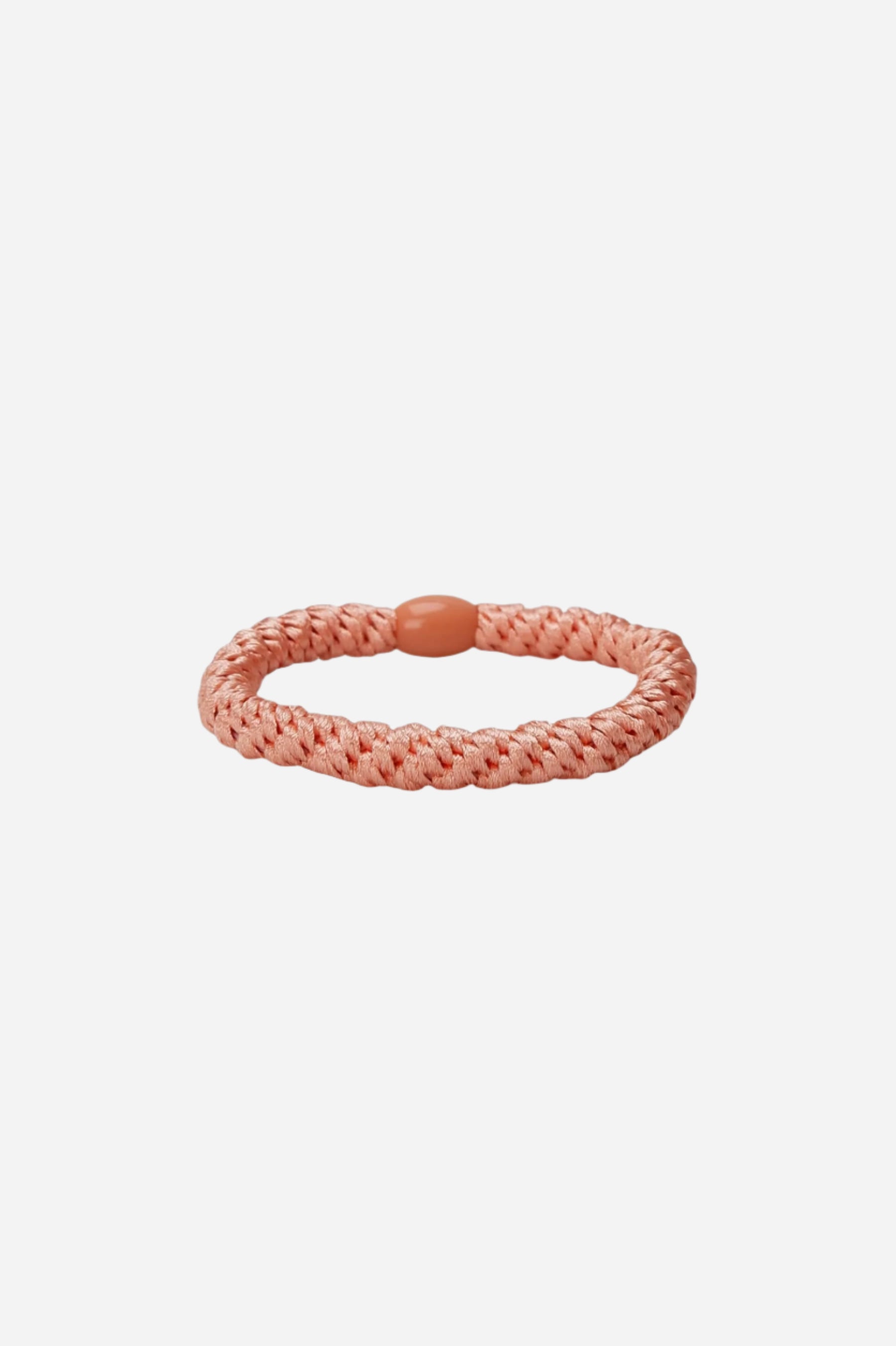 Elasticated hair band with bead