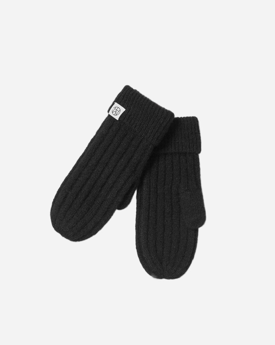 Pair of black knit mittens on a white background