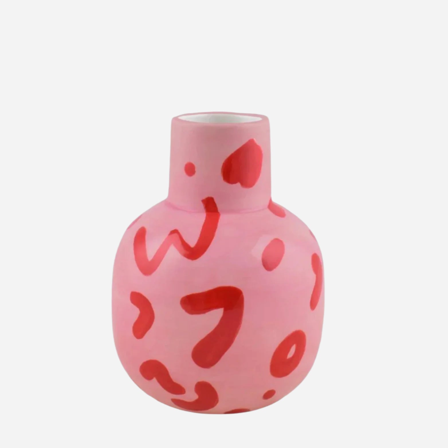 Pink vase with red abstract patterns on a white background
