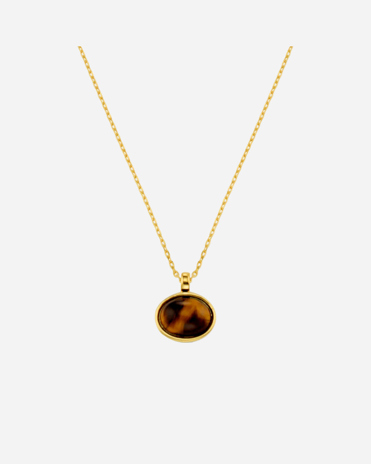Gold necklace with a tiger's eye pendant on a white background