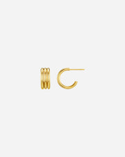 Gold hoop earrings on a white background