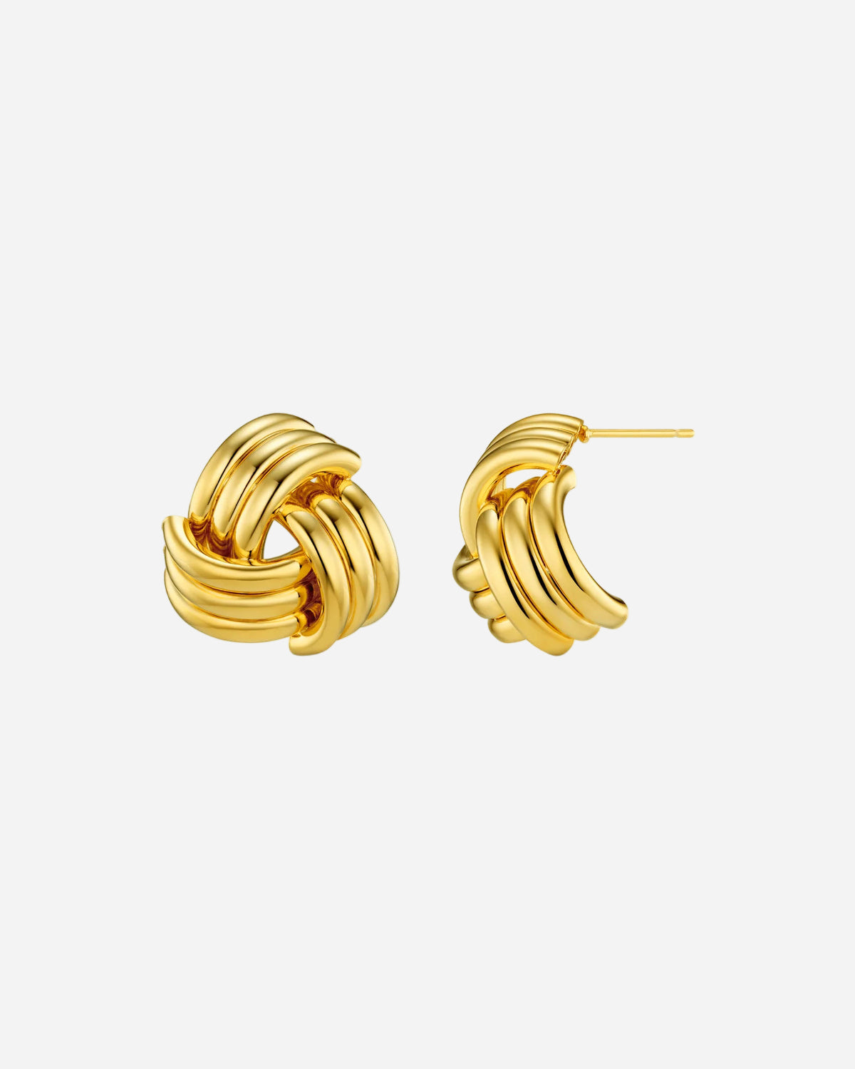 Pair of gold knot earrings on a white background