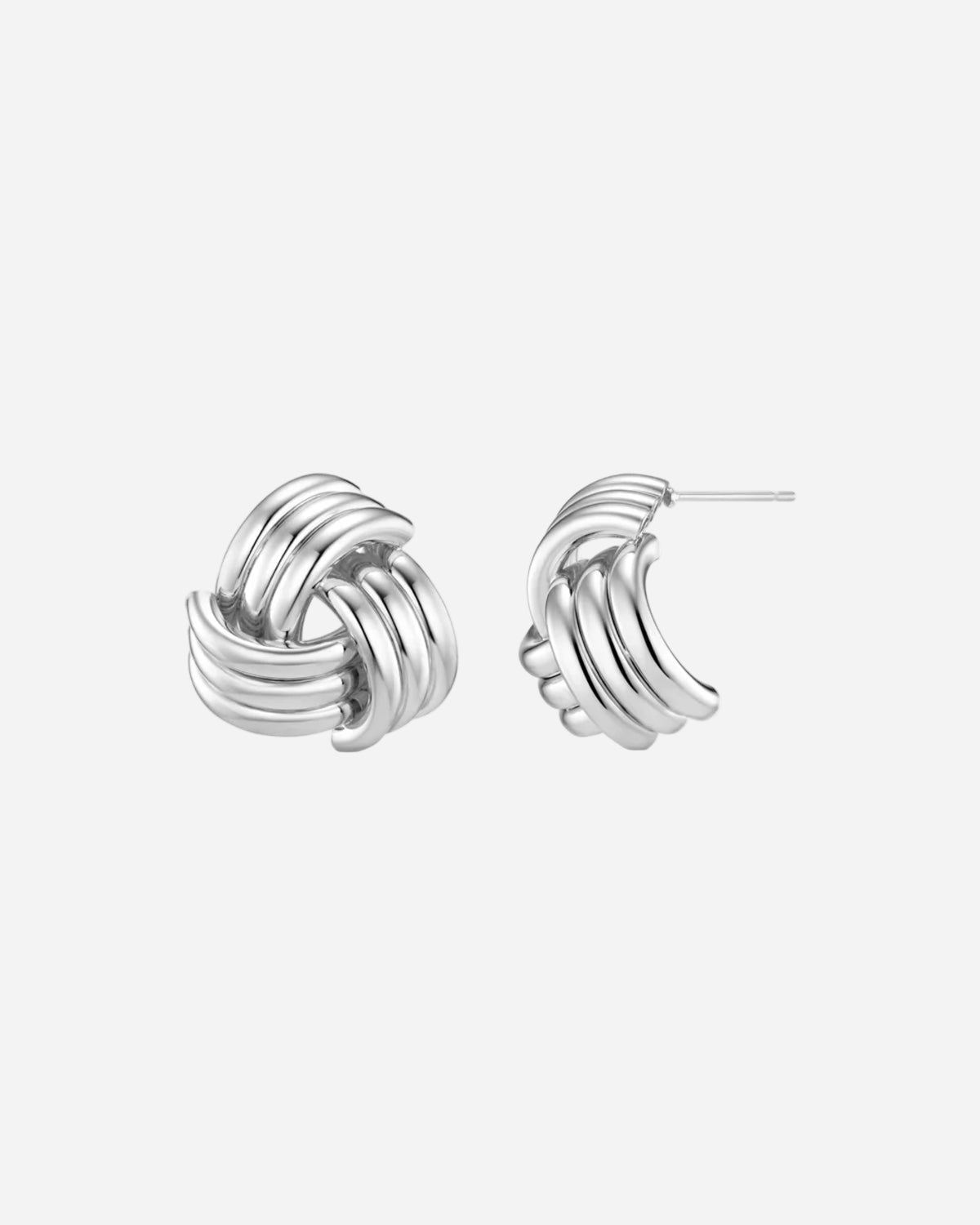 Pair of silver hoop earrings on a white background