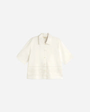 White shirt on a light gray background