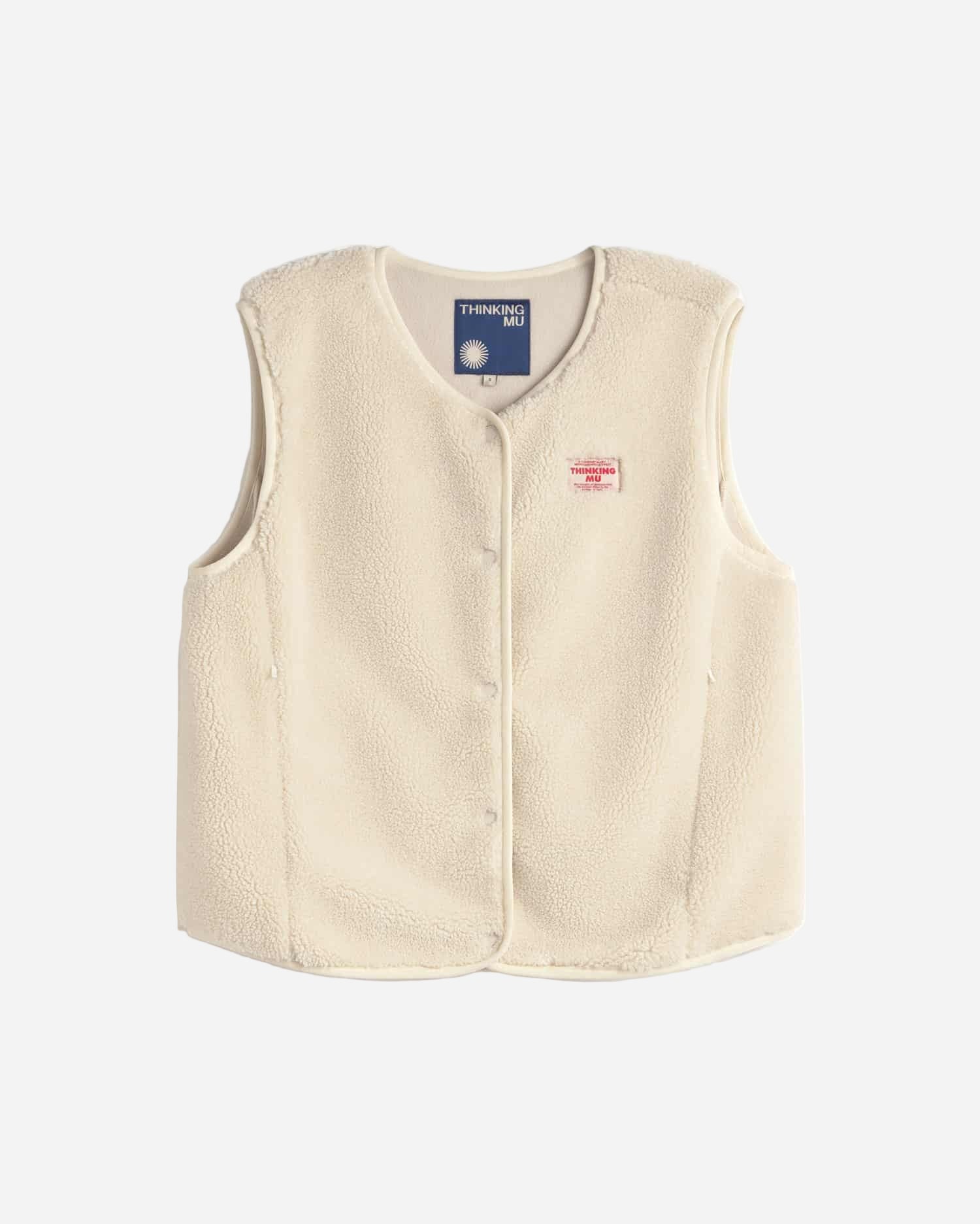Beige vest with a blue label on a white background