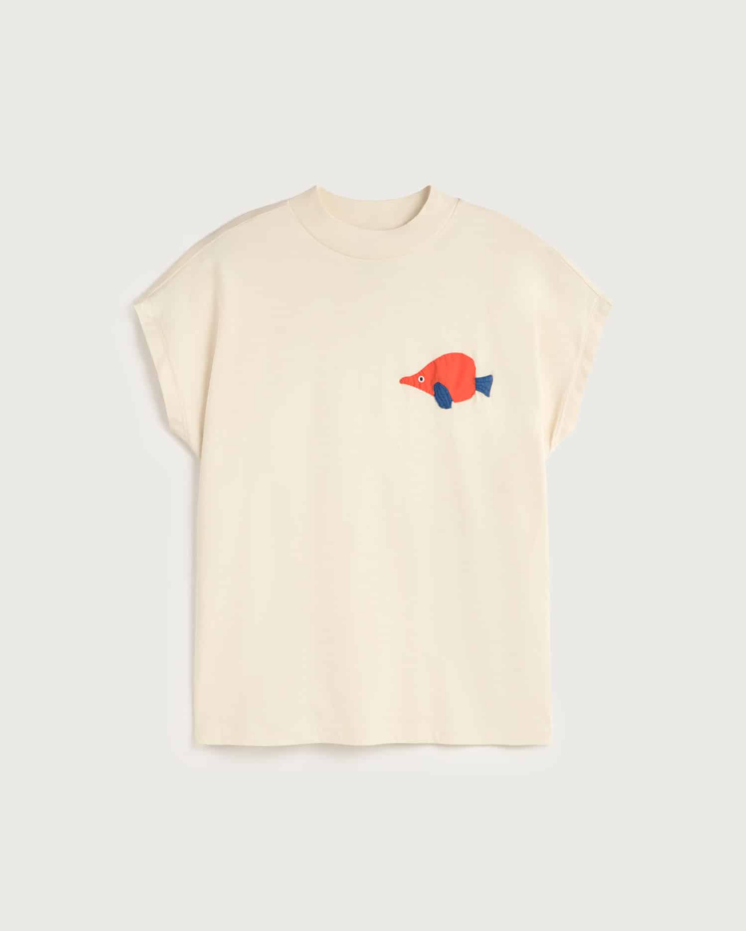 Beige t-shirt with a colorful fish design on a light gray background